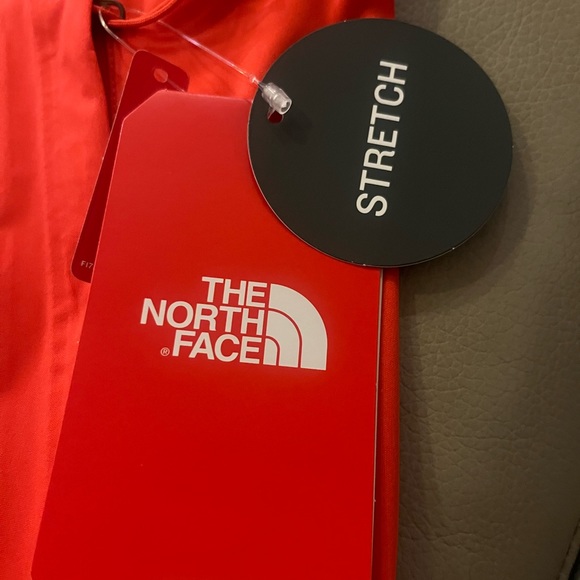 A orange north face jacket - Picture 2 of 4